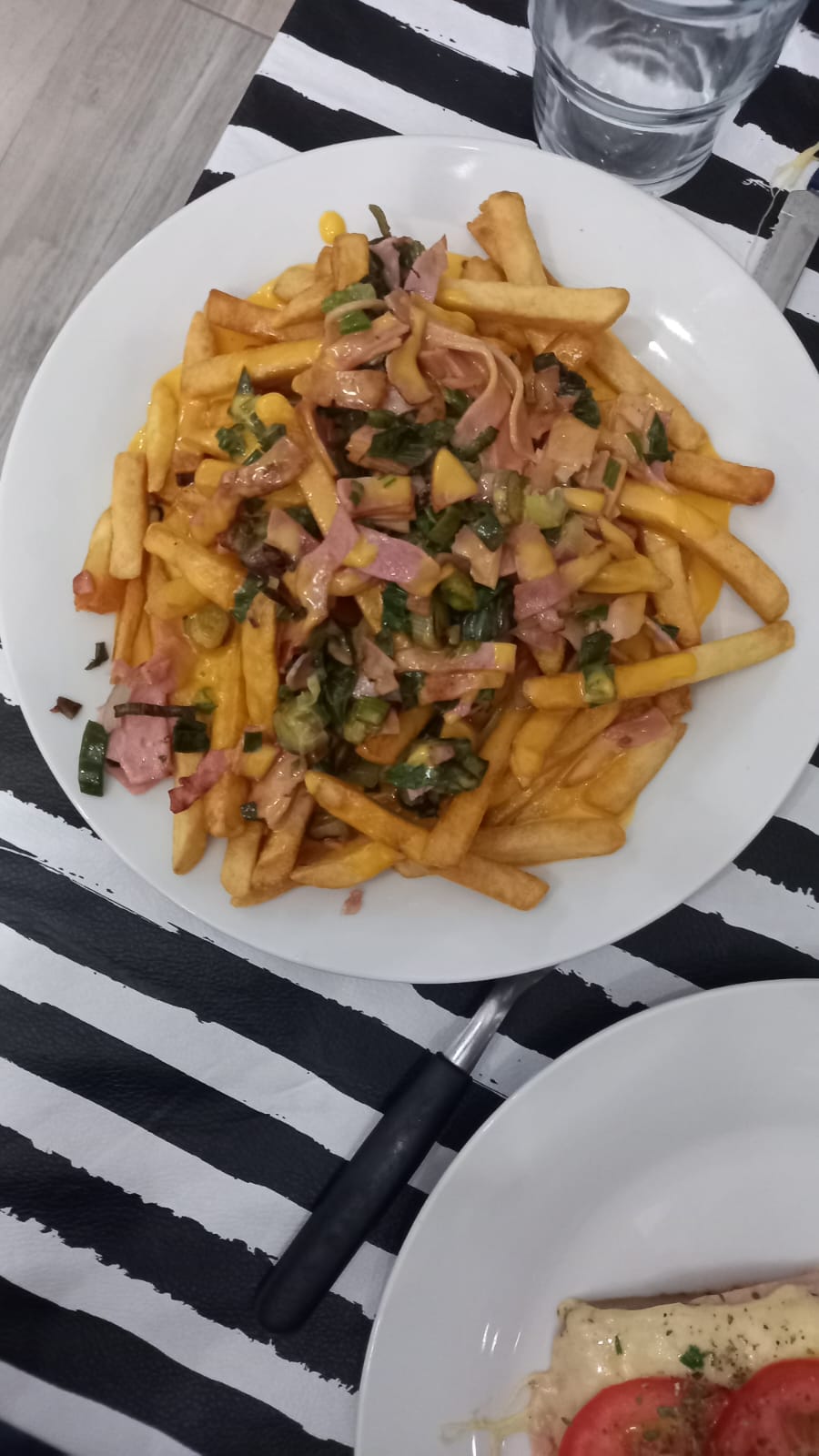 Pescado frito con papas en Patria Mia